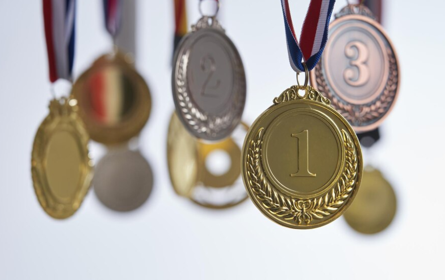 Como as medalhas esportivas personalizadas podem motivar sua equipe?